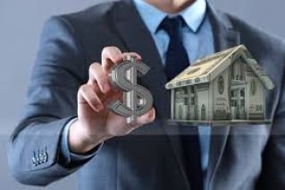 Couple experiencing stress while managing household finances at home.